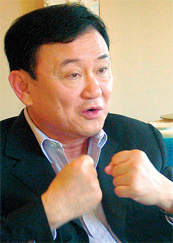 Thaksin won't accept house arrest, no matter how comfortable