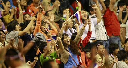 Smile. Thai women volleyball players beat Japan
