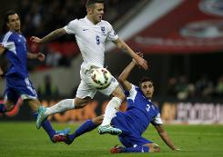 Hodgson cheered by newly dependable Wilshere