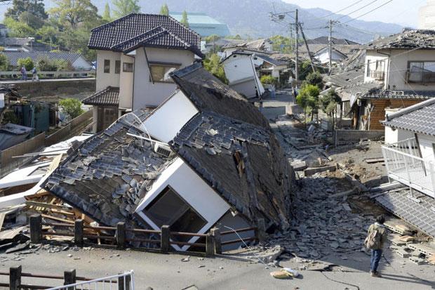 Houses are seen destroyed after an earthquake in Mashiki in Kumamoto prefecture in southern Japan on Saturday (Kyodo News via AP photo)