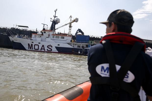 A Migrant Offshore Aid Station (MOAS) crewman returns to the mother ship MV Phoenix on the Chao Phraya river in Samut Prakan on Feb 26, prior to the group's departure for the Andaman Sea. (Reuters Photo)