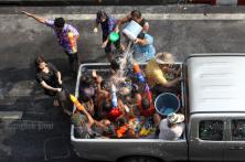 This is now a no-no. The maximum number of people allowed to sit in a pickup bed is six. (Bangkok Post file photo)